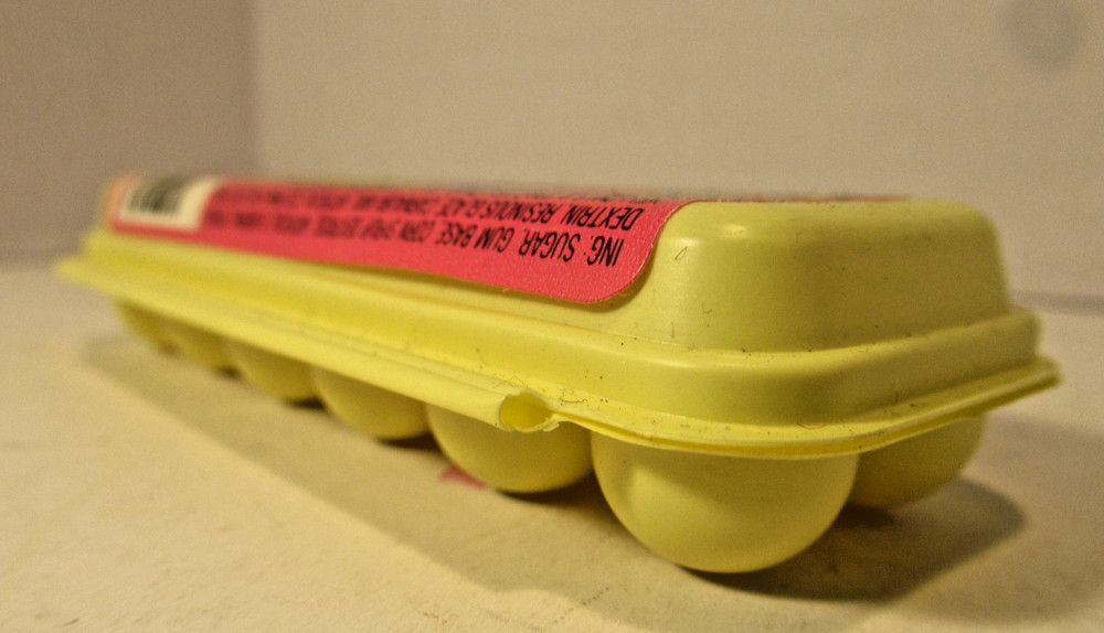 Vintage Eggums Bubble Gum Eggs Candy Container 4 inches empty package Leaf GUM