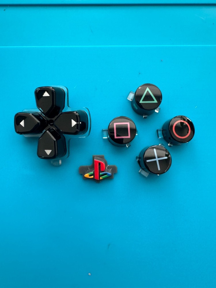 30th Anniversary PS5 6 Piece Retro And Glass Button Set. PS5 Controller