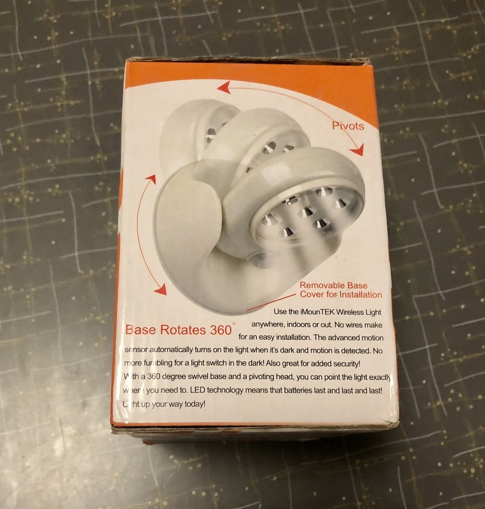 NIB Motion Activated Cordless Light with 7 LED Bulbs