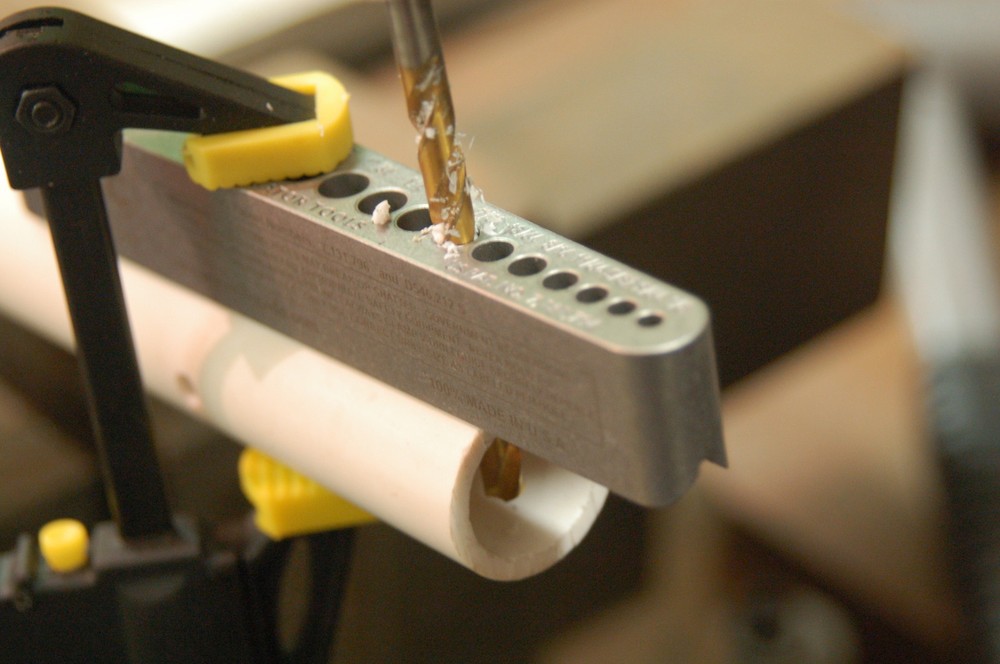 drill bit guide tool: comparable to a portable drill press -no bushings required