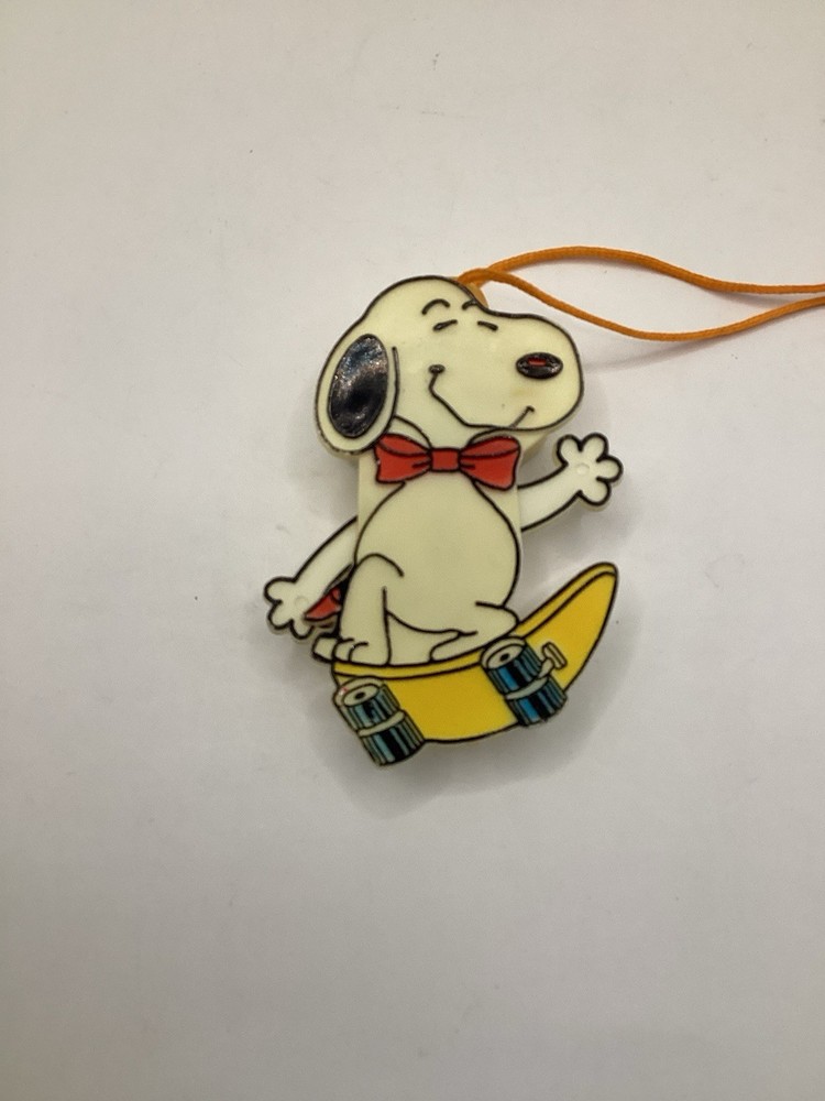 Vintage 80s Peanuts Snoopy Pull String Motion Skateboarder, Figures & Protractor
