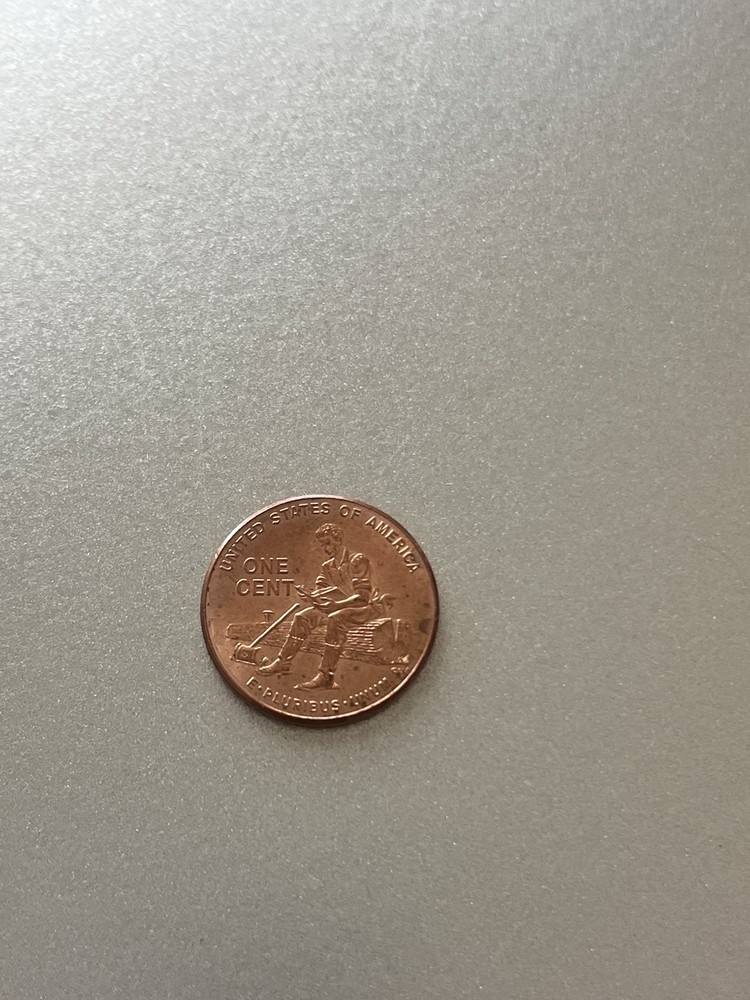 2009 Lincoln Sitting On Log Penny