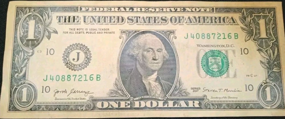 Uncirculated crispy 2017$1 Bill (ERROR PRINTED as smoked or missing Ink)