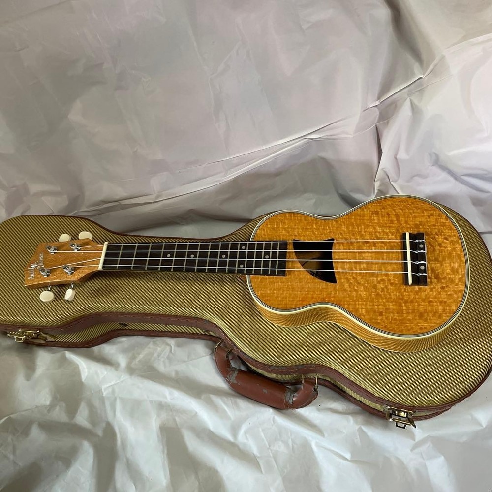 Soprano size ukulele and hard case