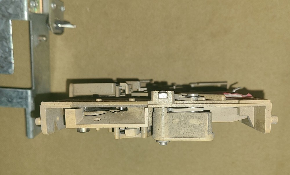 Coinco coin acceptor with jukebox bracket - untested