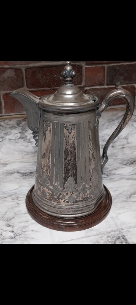 Silver-plated Victorian water pitcher with ice chamber, circa 1870s
