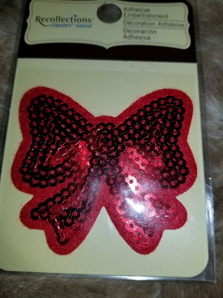 red ribbon embellishment recollection scrapbook