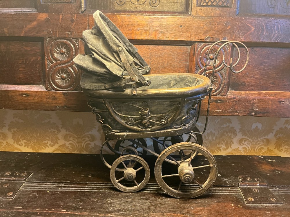 Vintage style toy pram.