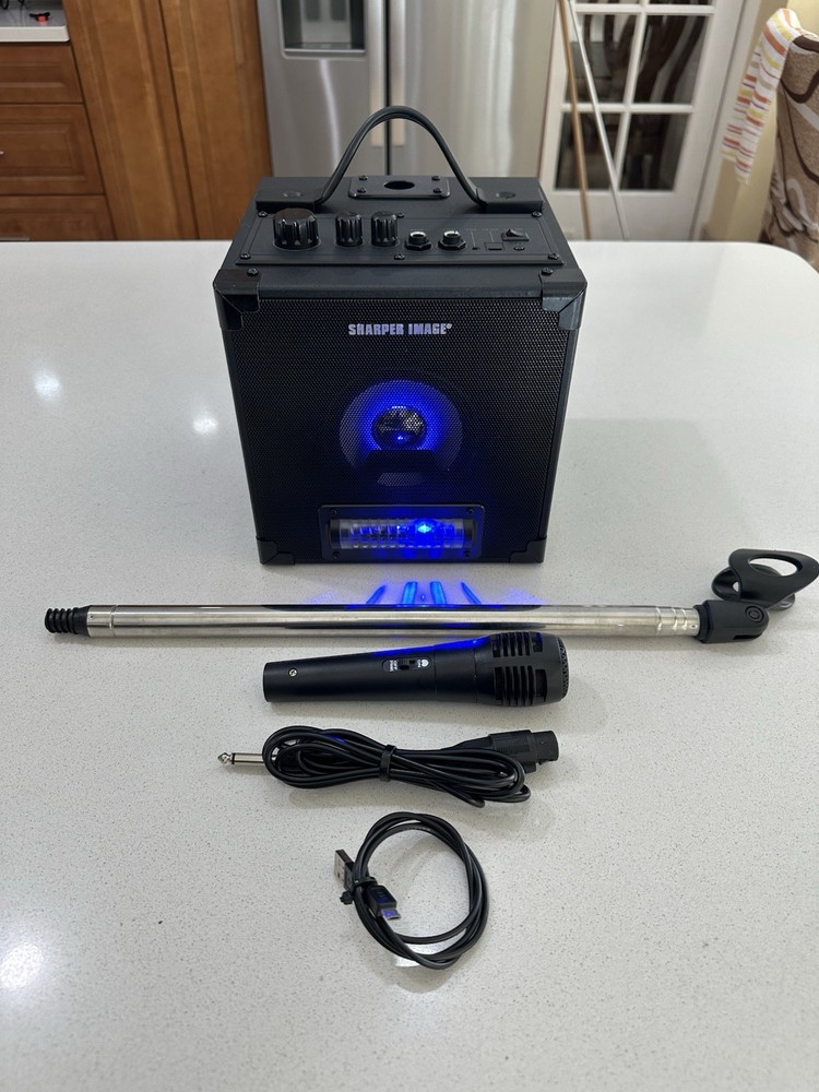 Sharper Image Model: SBT1050 Rechargeable Karaoke Singing System.