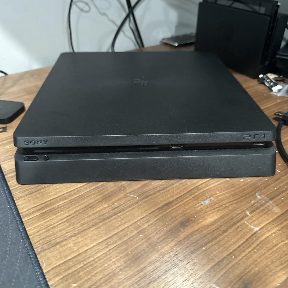 Playstation 4 Slim 2TB SSD + 4 Controllers & Charging Dock