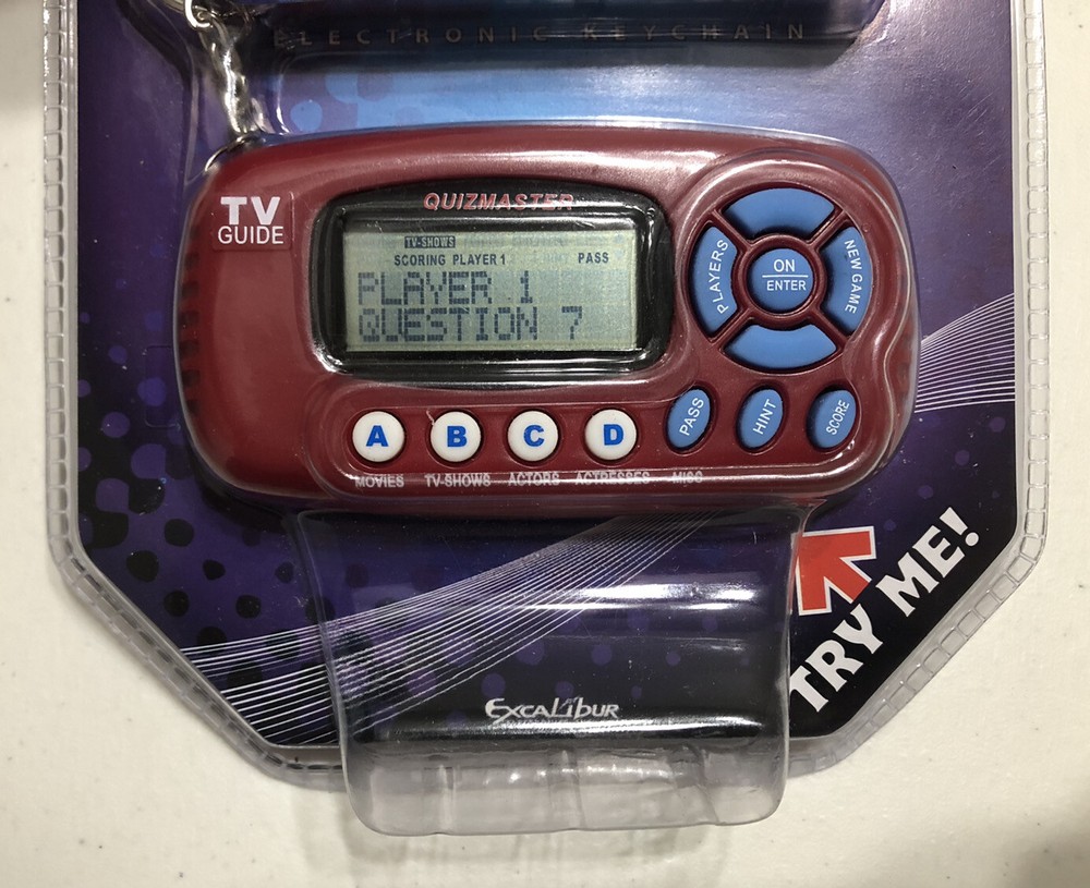 New Excalibur Electronics TV Guide Quiz Master Electronic Keychain, Model: TV40