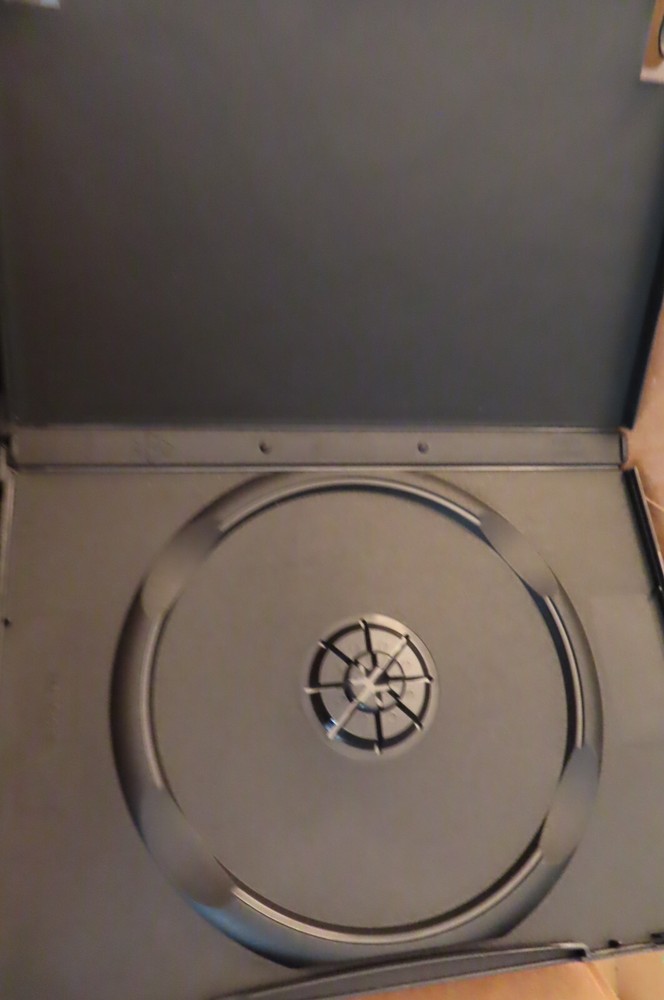 21 Empty DVD Cases. Used. Black. Clear.