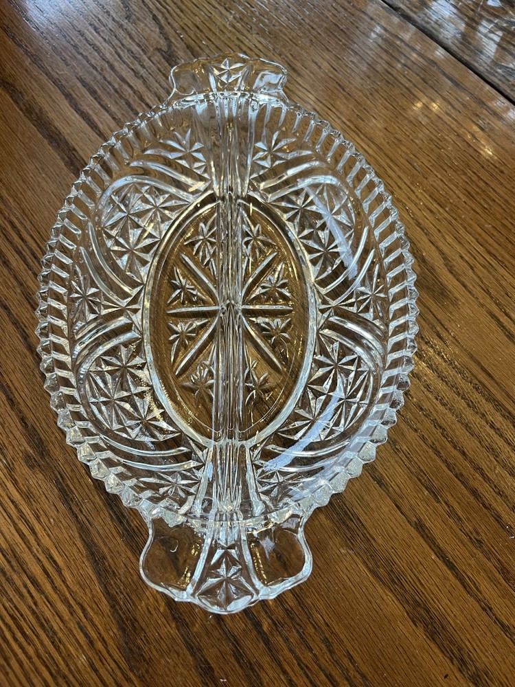 Clear glass oval serving tray with starburst pattern