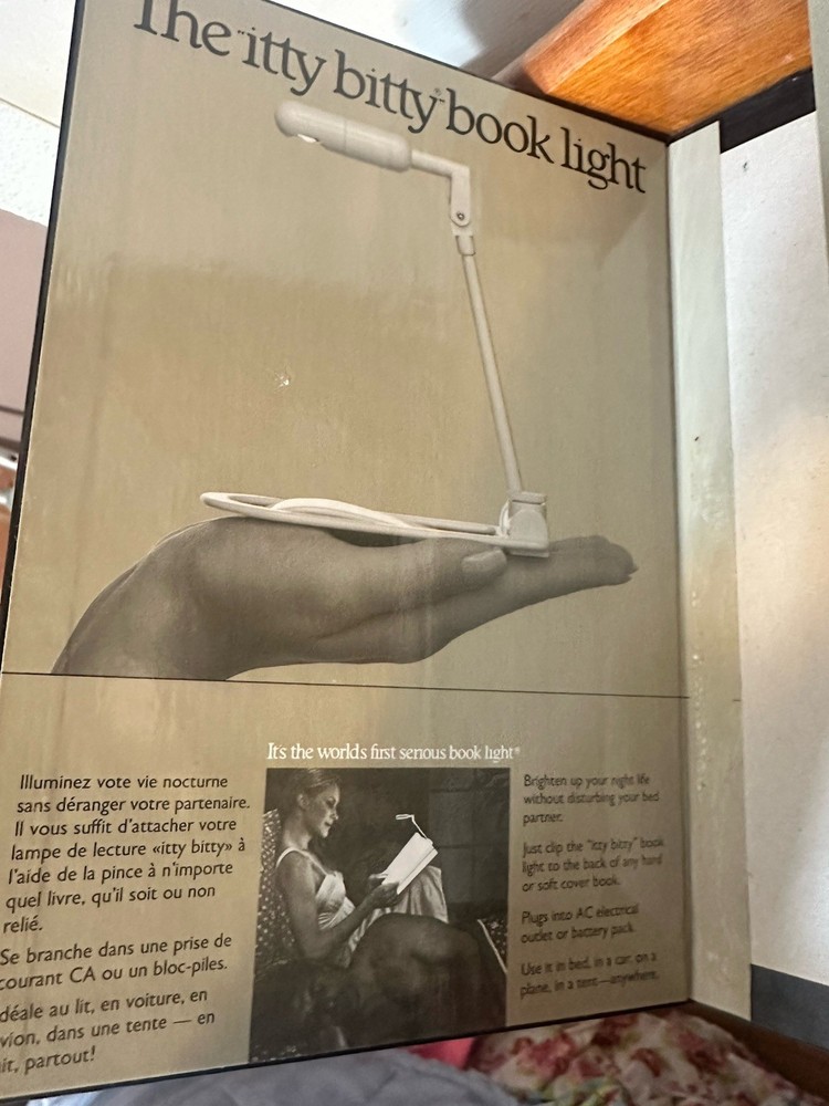 1980’s Original, The "itty bitty book light". Before LED lights