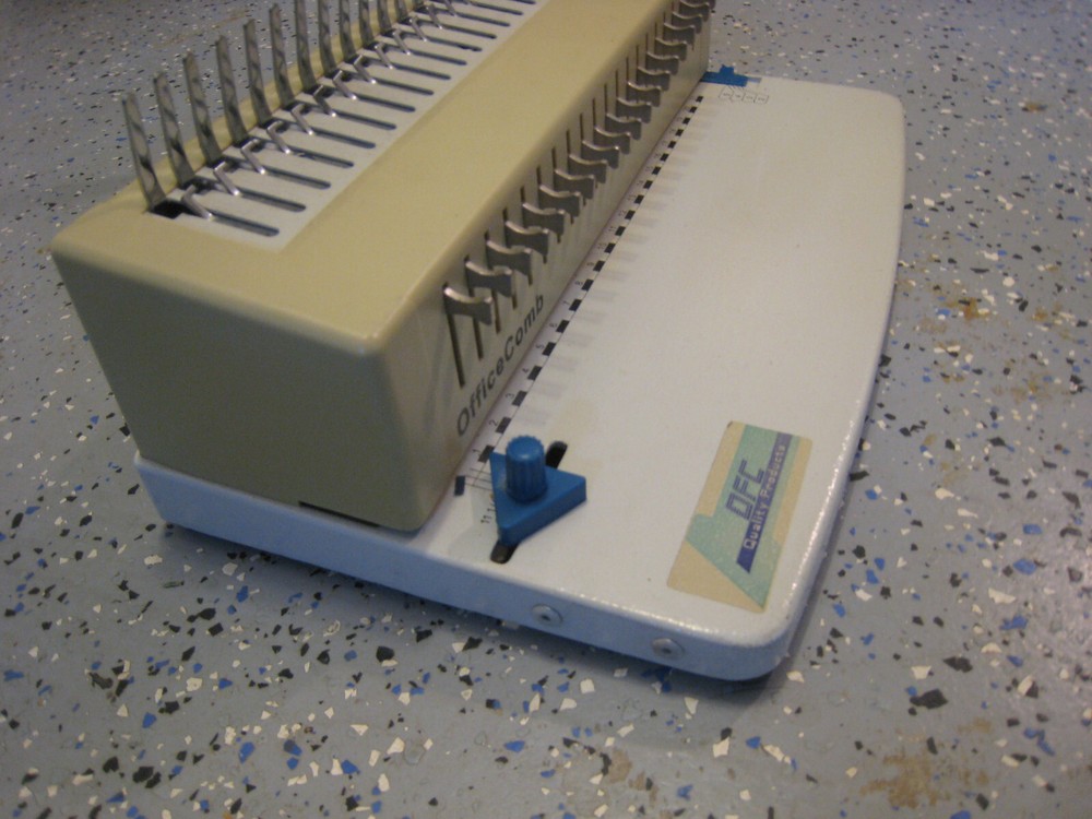 OFC Office binding comb machine Used 8 Times. Punches and Binds.