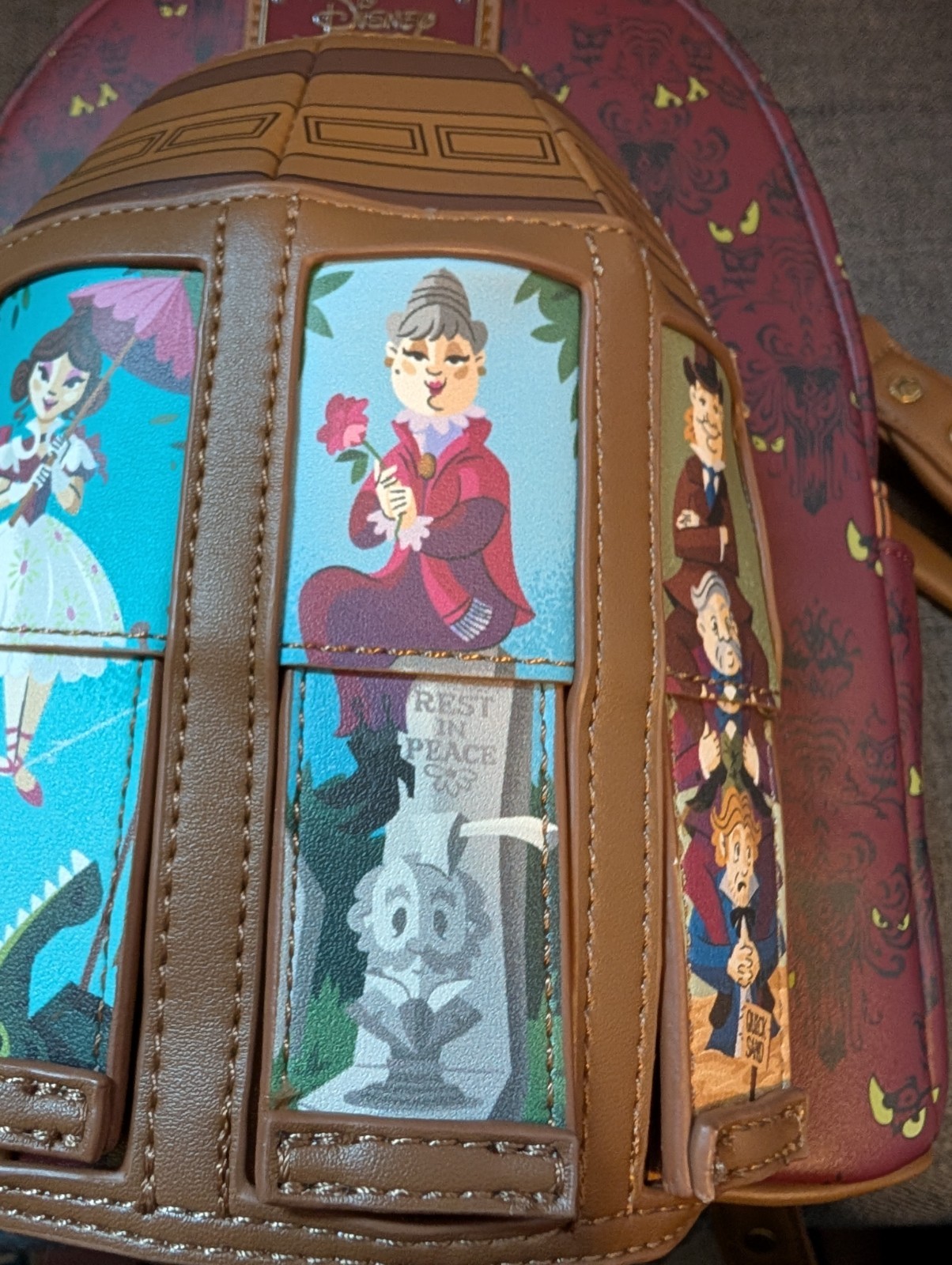 Disney Haunted Mansion Stretching Room Portraits Glow-in-the-Dark Mini Backpack
