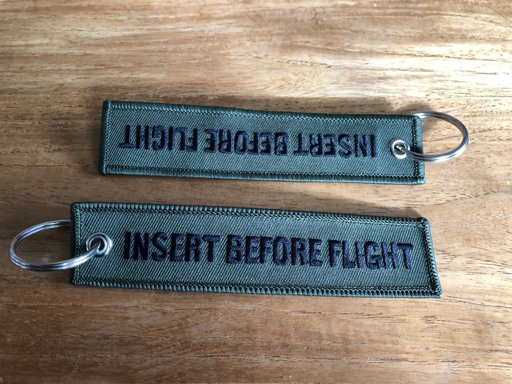 INSERT BEFORE FLIGHT embroidered keychain