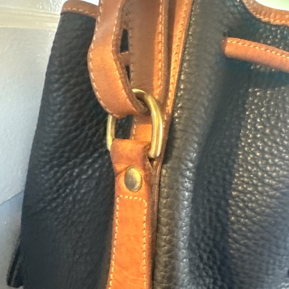 Dooney & Bourke Gorgeous Drawstring Shoulder Bag - Stylish and Authentic