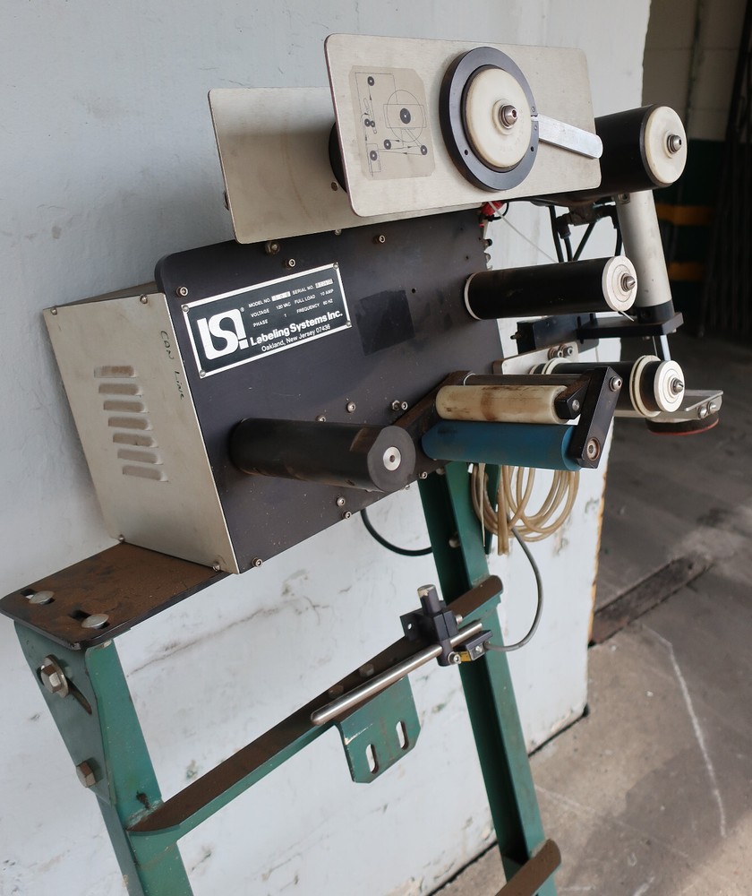 LSI Model 306 Pressure Sensitive Top Labeler Used