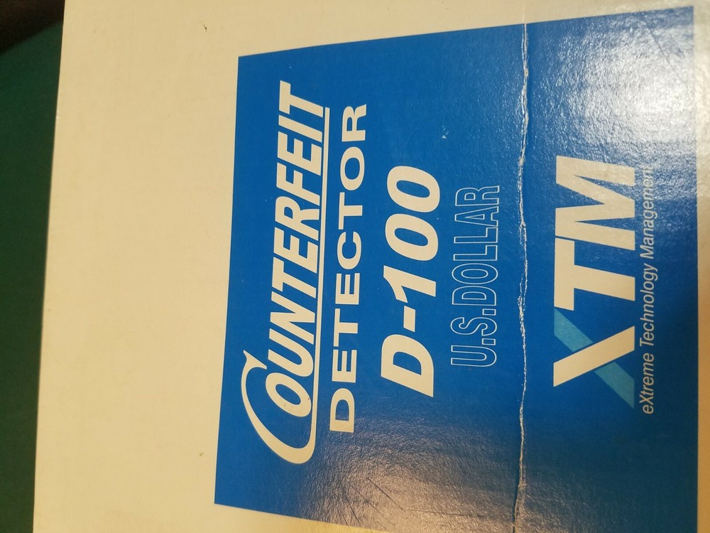 U.s. dollar counterfeit detector