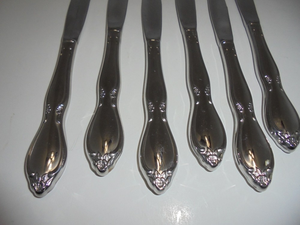 6 Oneida Community Stainless Chatelaine Dinner Knives