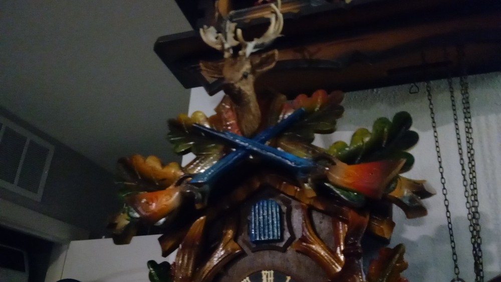 Blackforest Blue Guns Cuckoo Clock Eight Day.