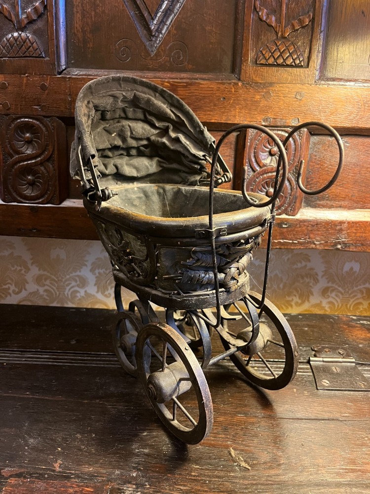 Vintage style toy pram.