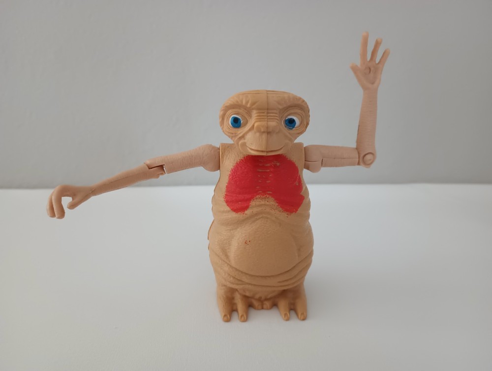 1982 E. T. Photo Button New in Package & Mechanical E.T. Plastic Figure