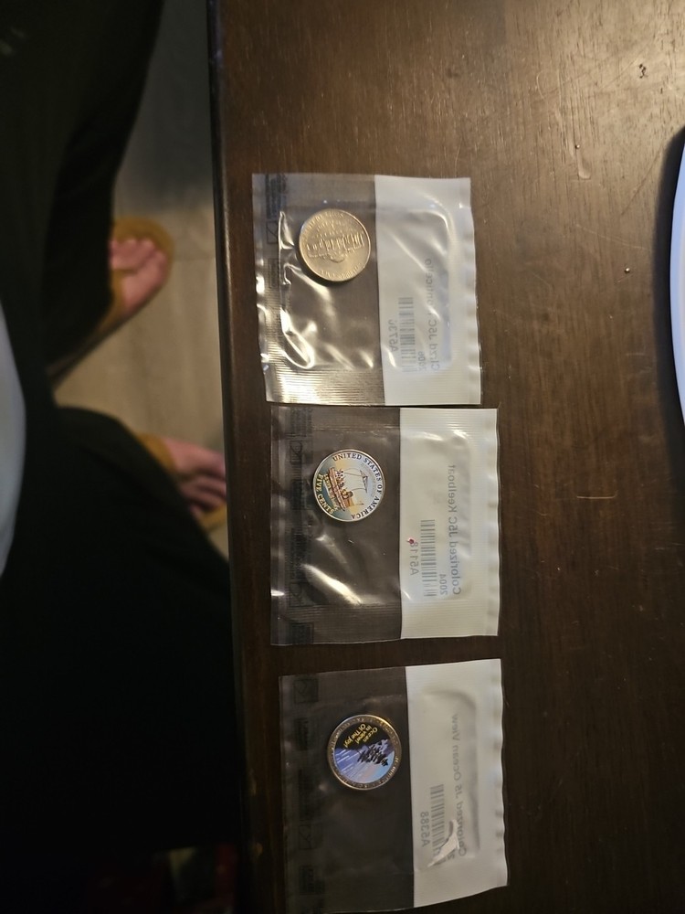 Three Colorized Coins