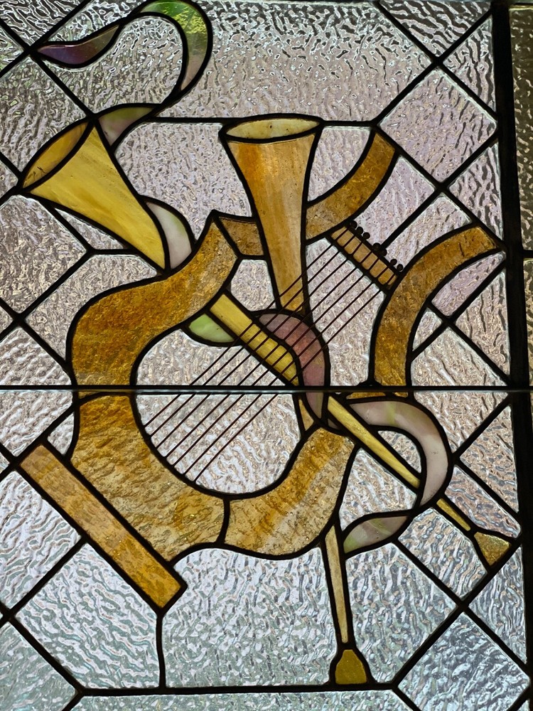 Musical instruments stained glass window