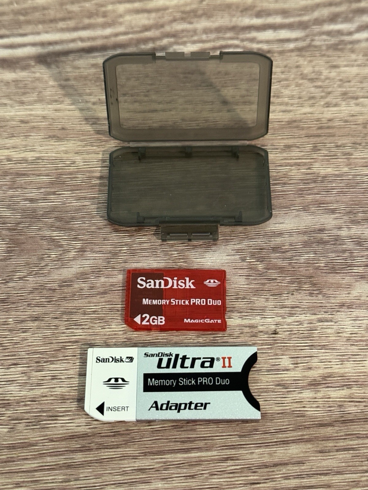 SanDisk Memory Stick Duo Adapter with 2GB Memory stick Genuine New Old Stock