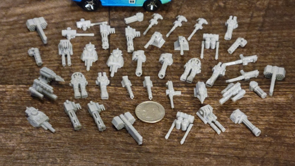 Tiny Weapons Pack Ver# 2 Gray 3d printed over 40 items. 19 to 22 mm long.