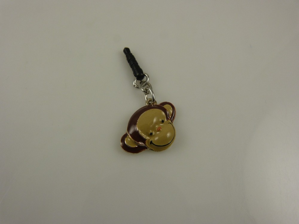 Monkey head smiling cell phone fits Ipad charm ear cap dust plug