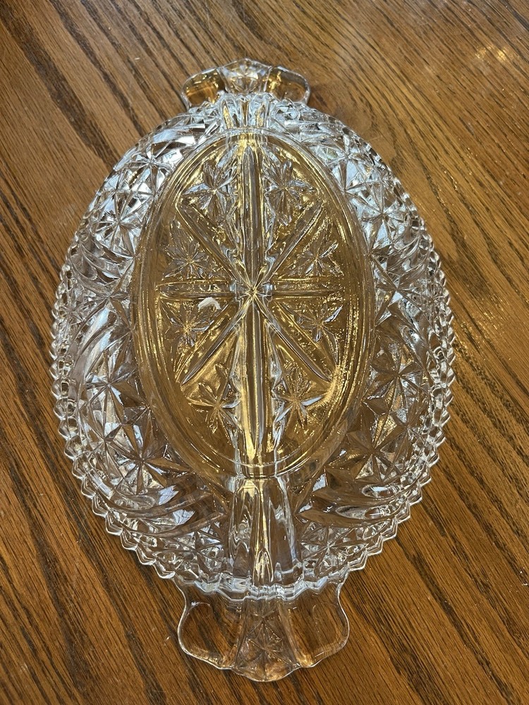 Clear glass oval serving tray with starburst pattern