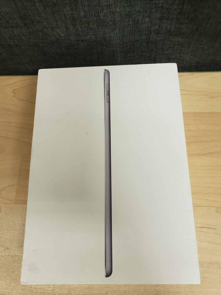 Apple iPad 6th generation Still in Plastic