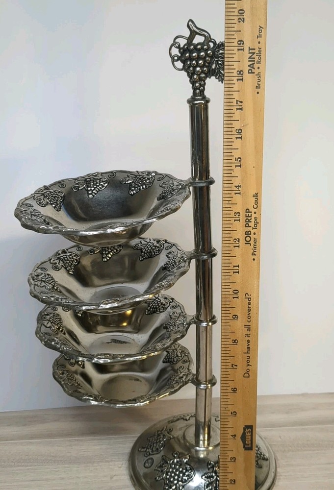 Vintage Godinger Silver Co. 4-tier rotating server with a grape/leaf design.