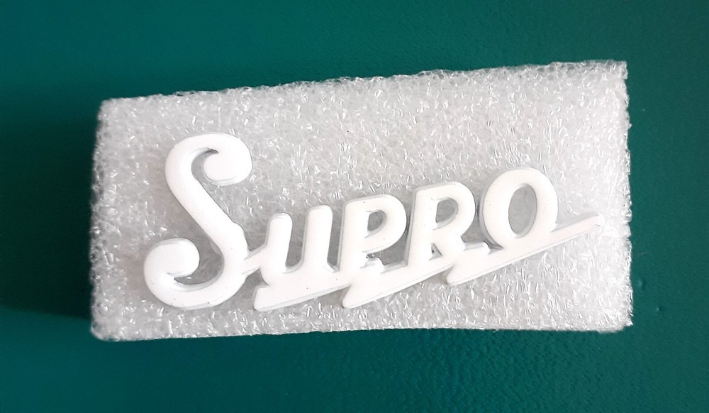 Supro Guitar Logo White with pins