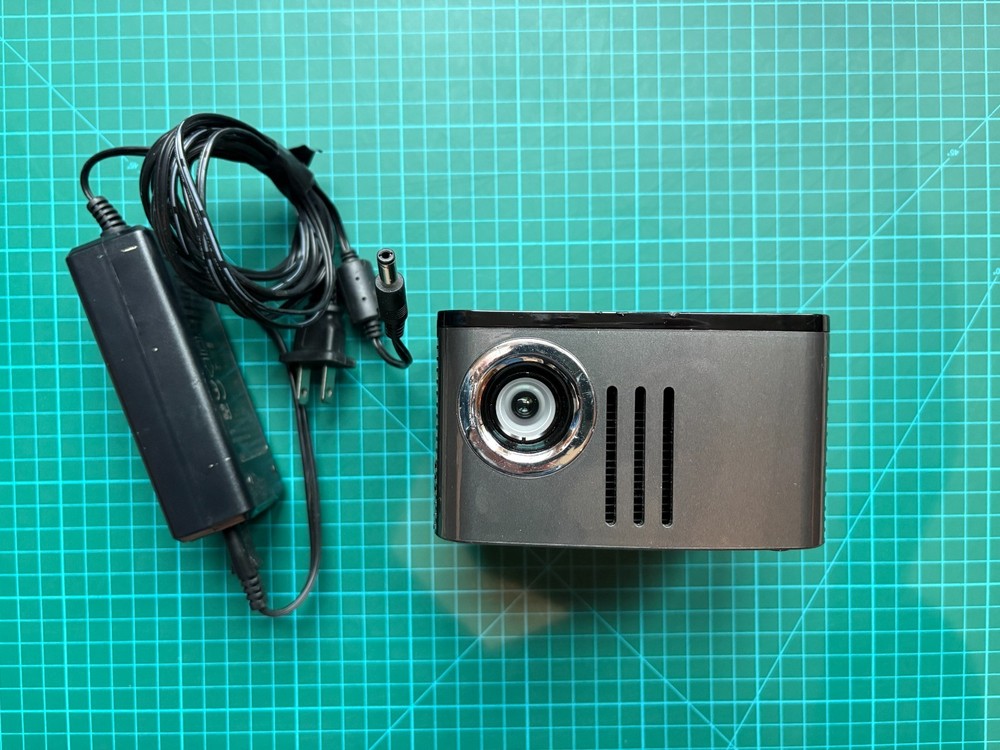AAXA P7 Native 1080p Mini LED Projector. Great plugged in.
