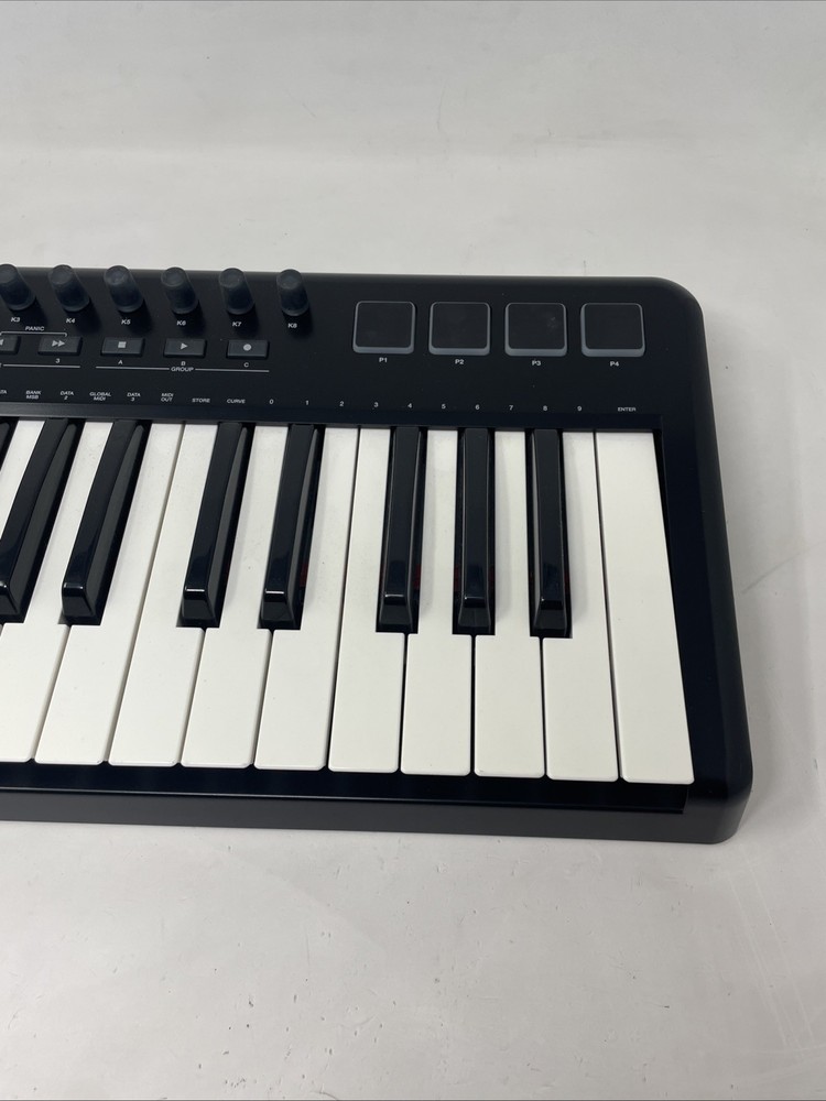 Alesis QX25 keyboard controller in great condition