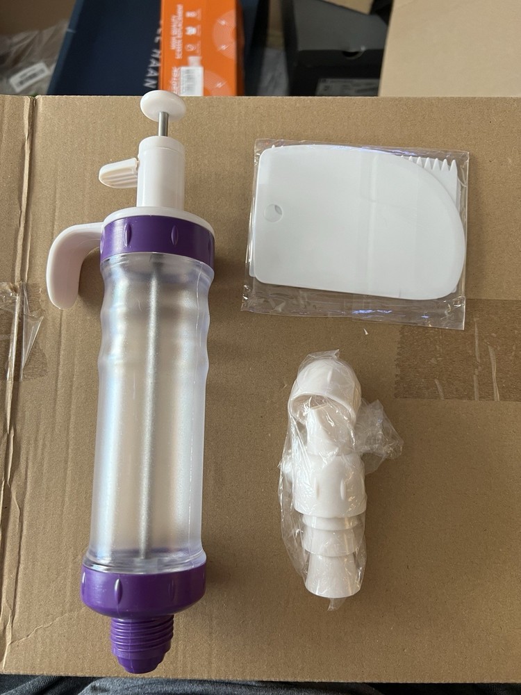 Multi-piece spritz Cookie Press Set With Scrapers And Multiple Tips