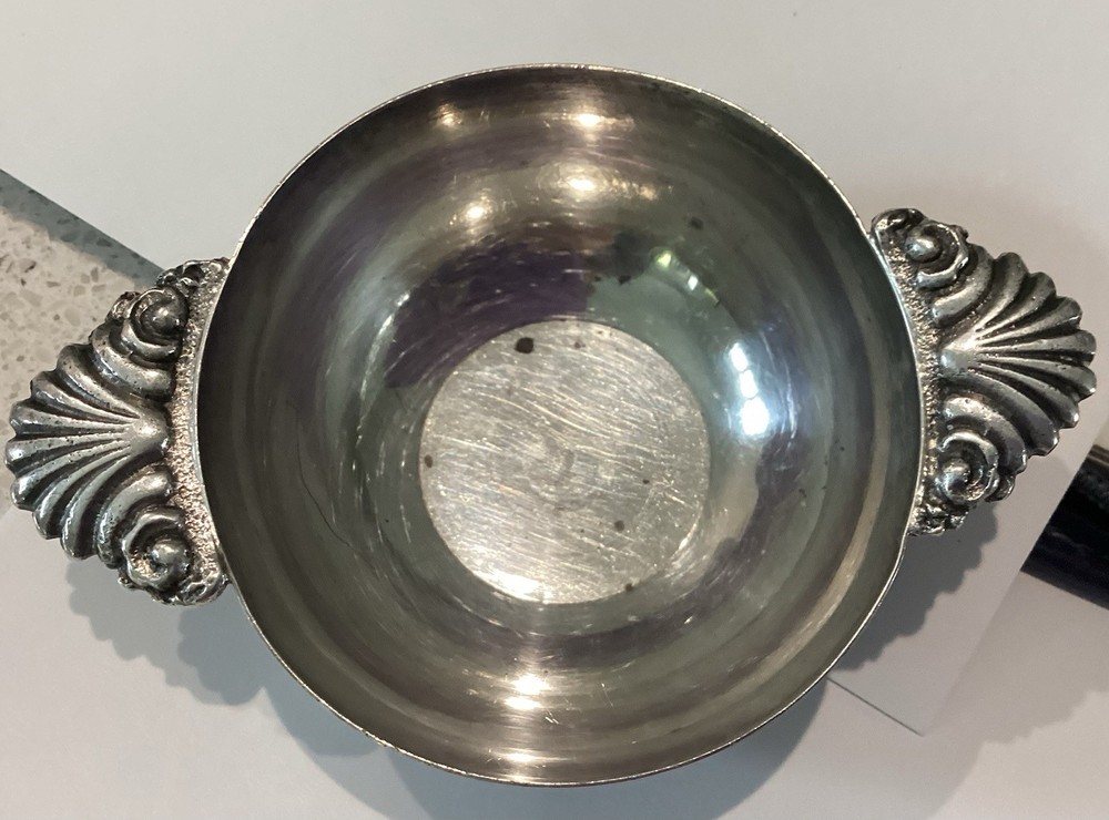 small silver wine tasting bowl