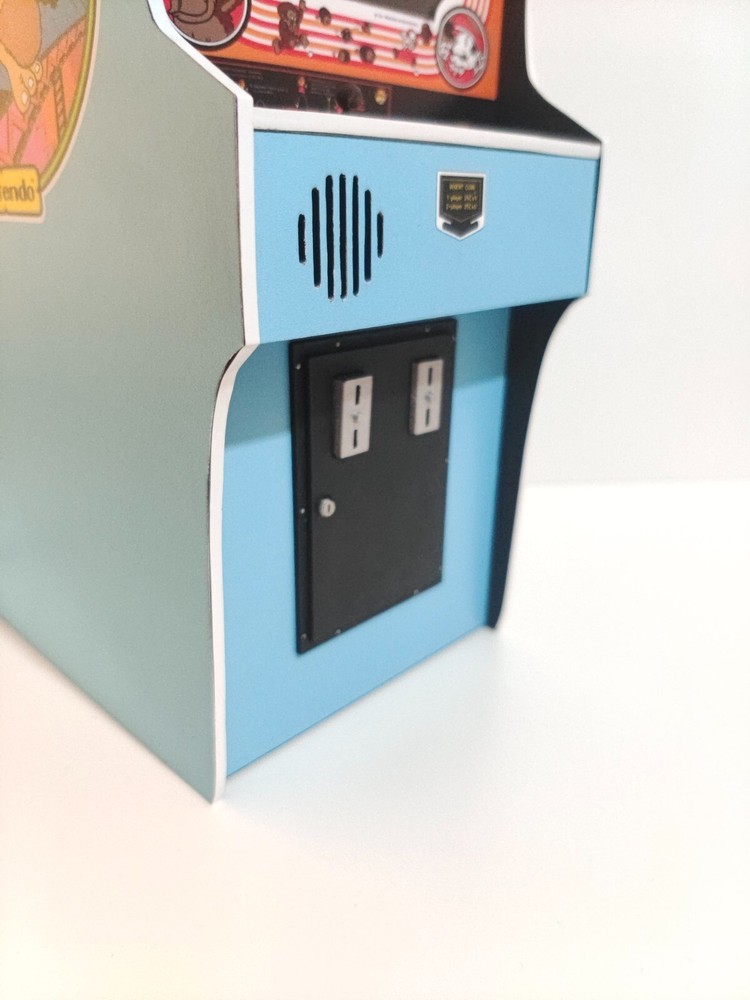 Donkey Kong trilogy plus 10 extra games. 1/6 scale mini working arcade cabinet.