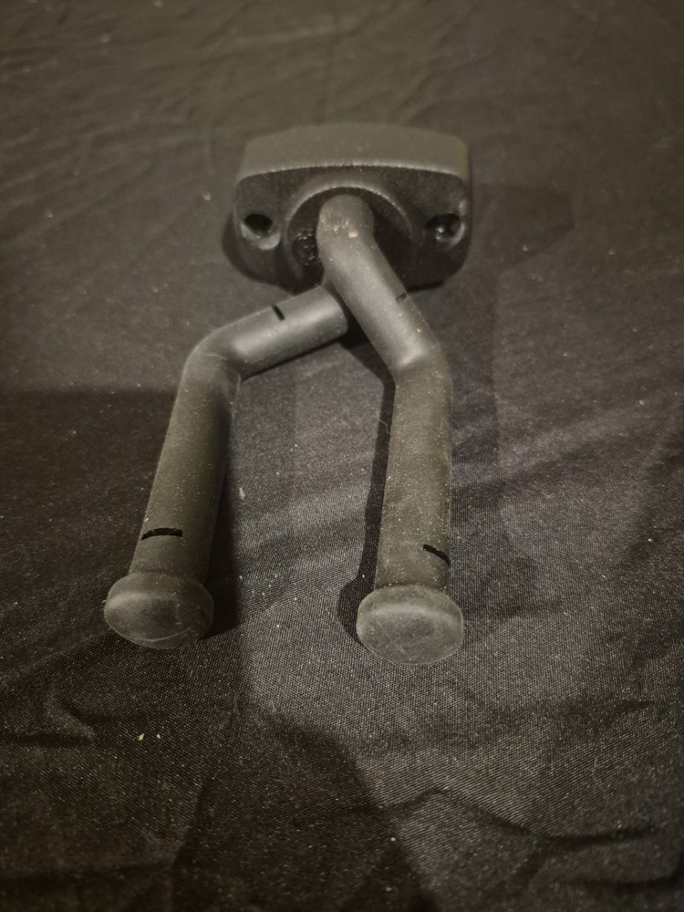 Guitar hangar wall mounted