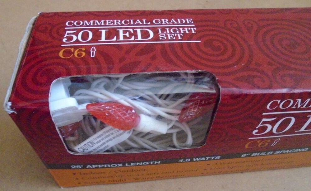 VICKERMAN Commercial Grade C6 String Light Set 50 LED Orange Light White Wire