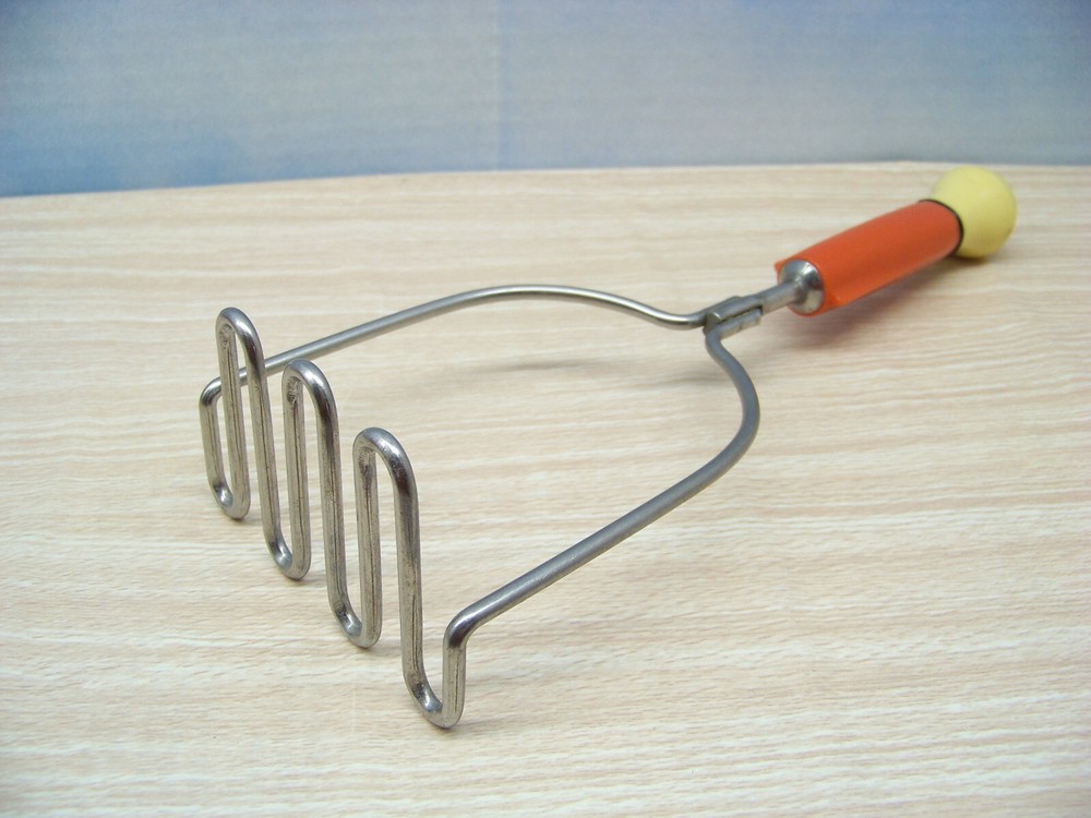 Bakelite Masher - Orange & Yellow Handle