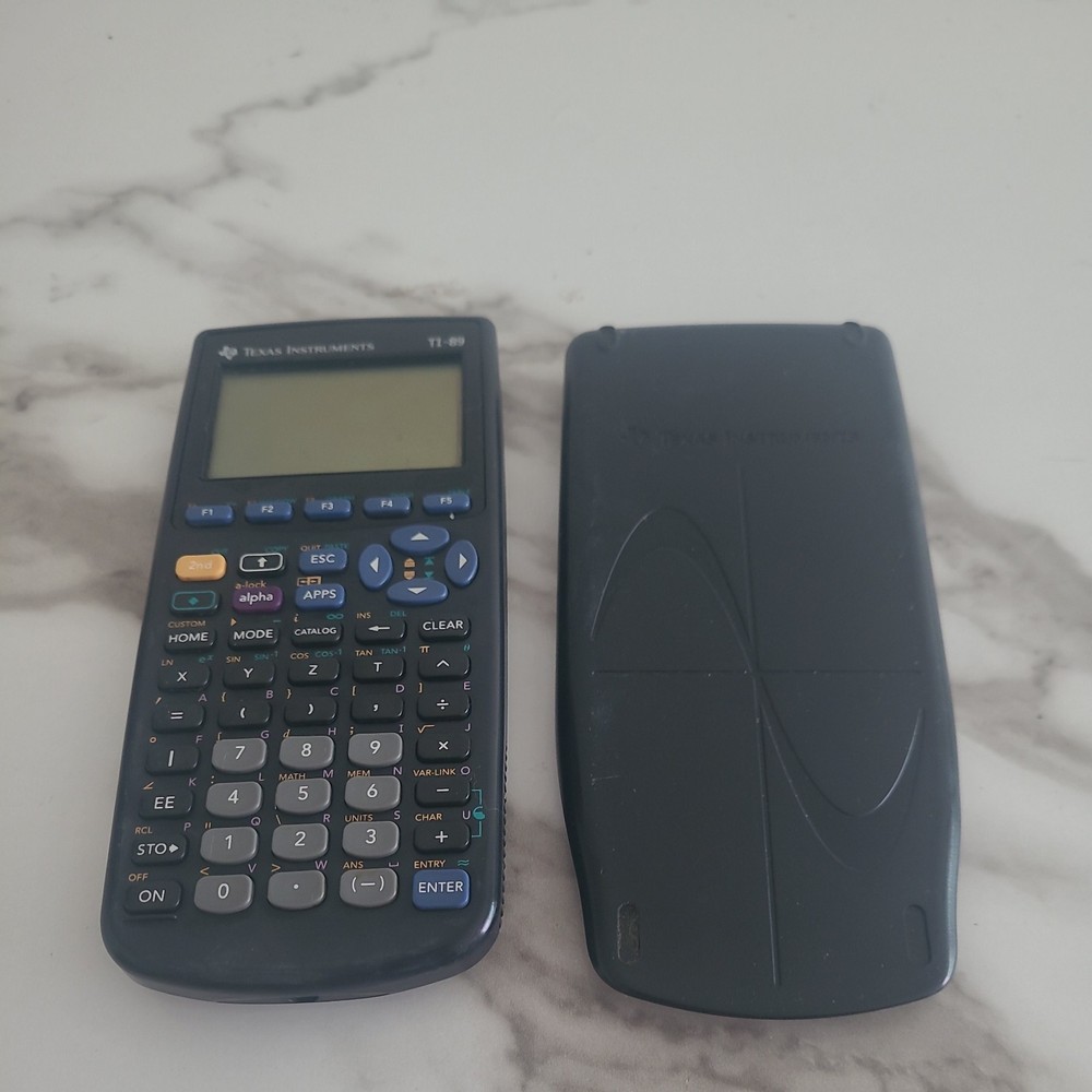 Texas Instruments TI-89 Calculator, powers on, Unknown if fully functional