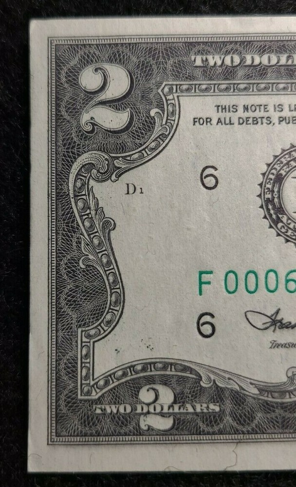 1976 $2 FRN Error, low serial #, star note F 00067891 * STAR NOTE WITH ERROR