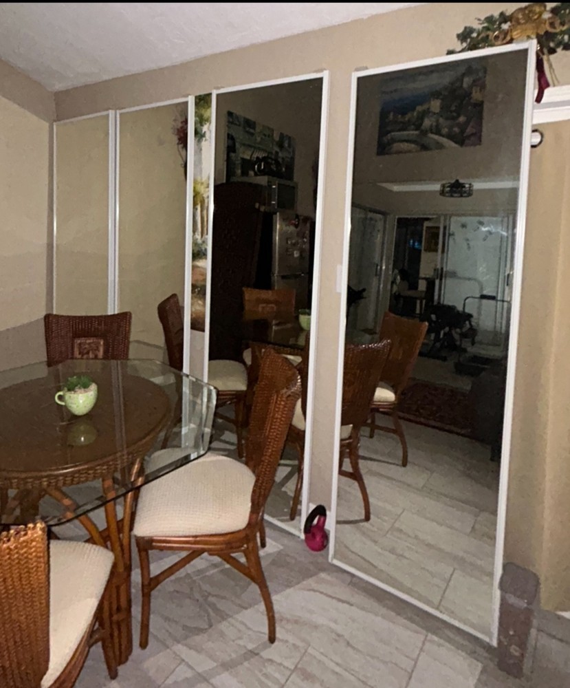 4 sliding  mirror closet doors with hardware attached