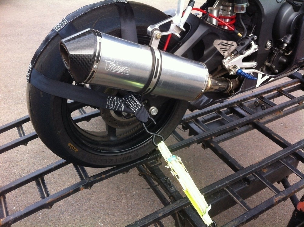 Rear wheel tie-down strap