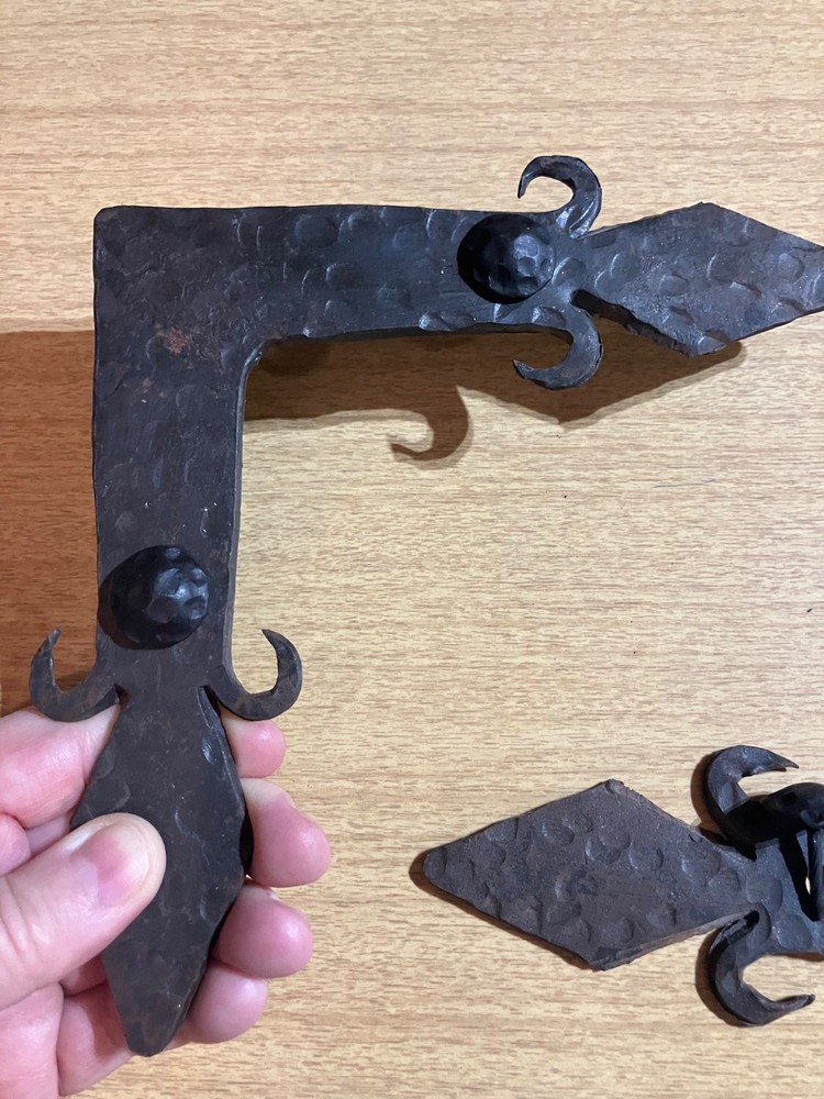 Mexican hand forged iron corner set with conchos